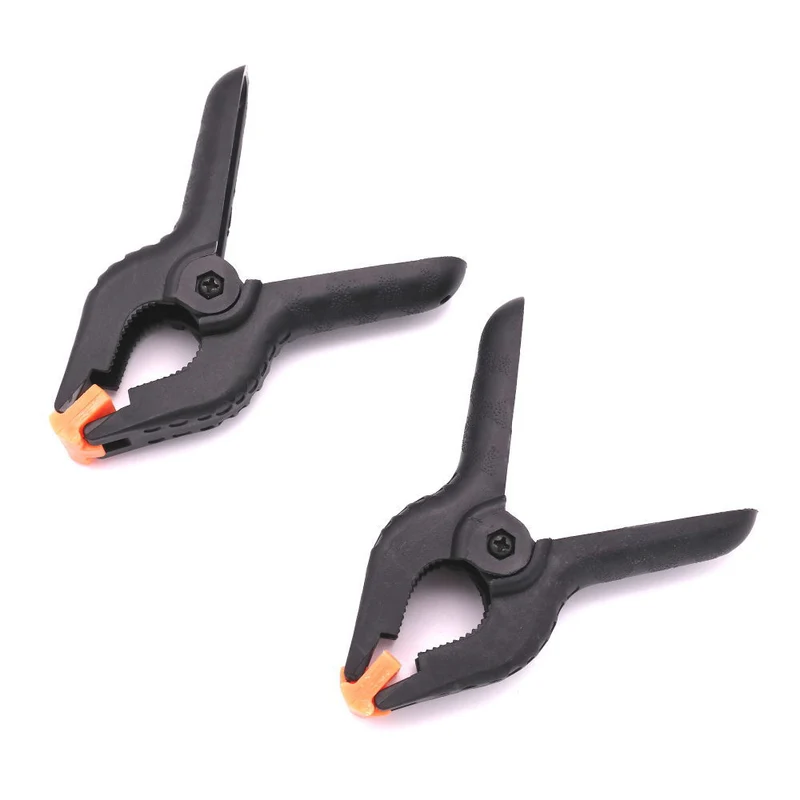 Caruba Clip de Fond Noir / Orange Large (2 Pièces)