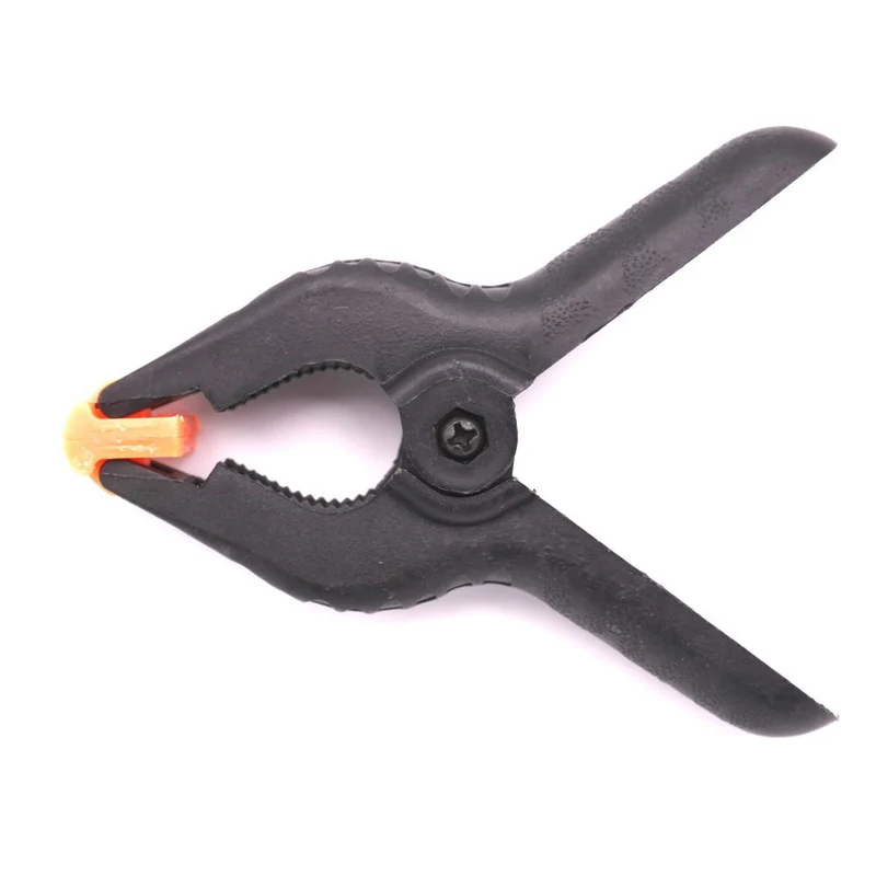 Caruba Clip de Fond Noir / Orange Large (2 Pièces)